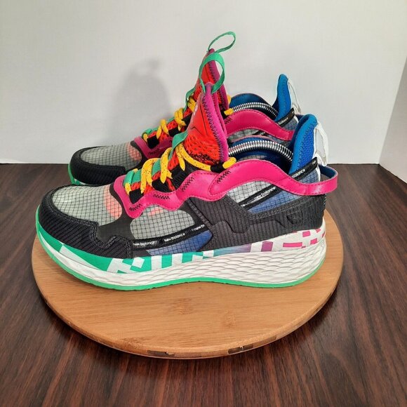 New Balance Pink and Orange Athletic Shoes with Dynamic Design - Picture 3 of 10